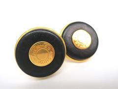 Hermes Black Leather and Gold Tone Hermes Paris Logo Round Earrings