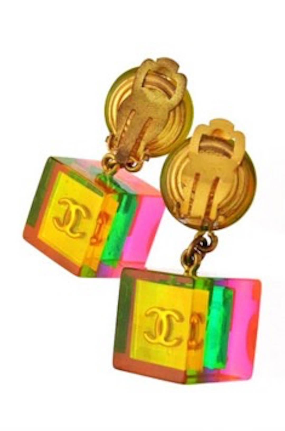 CURATOR'S NOTES

YOWZA!  PRICE REDUCED THIS WEEKEND ONLY!

Turn heads this summer with these rare, statement Chanel No. 5 cube multi-color earrings!  Featuring gold tone and chic pink, green and yellow colorblocking, these beauties are sure to