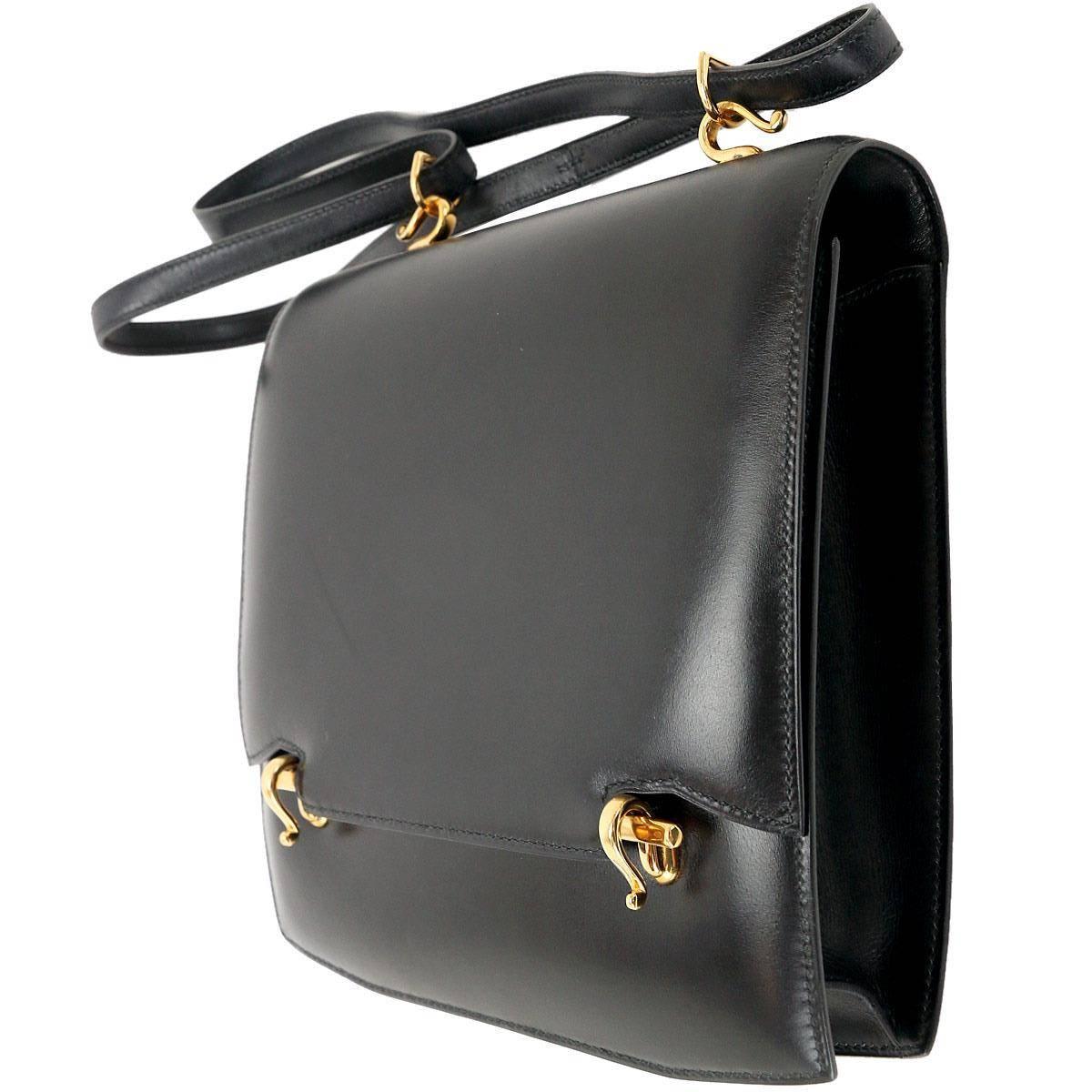 Hermes RARE Black Leather Gold Accent Two in One Clutch Shoulder Bag in Box In Excellent Condition In Chicago, IL
