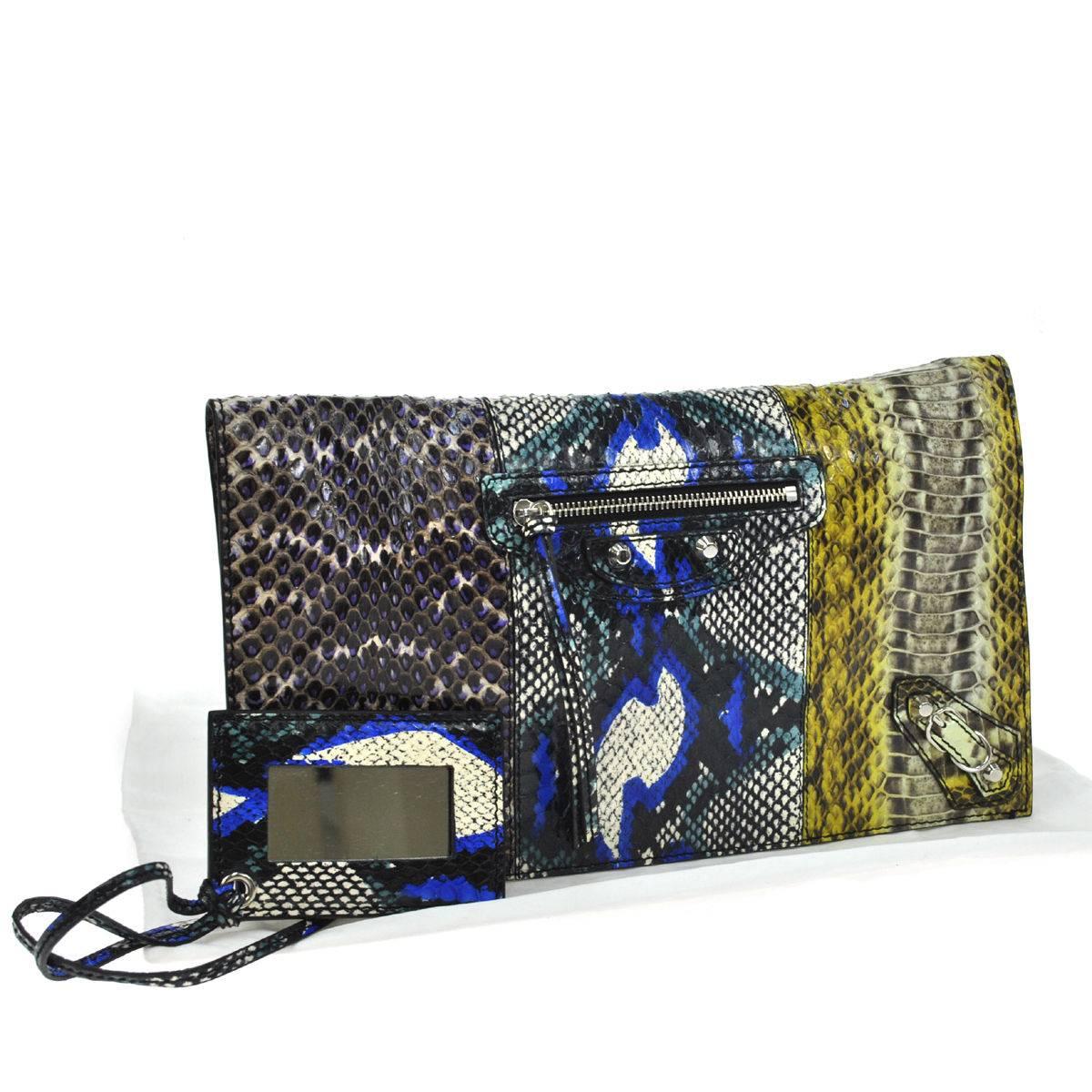 Balenciaga Multi Color Snakeskin Fold Over Envelope Evening Flap Clutch Bag

Python
Silver tone hardware
Twill lining
Made in Italy
Measures 11