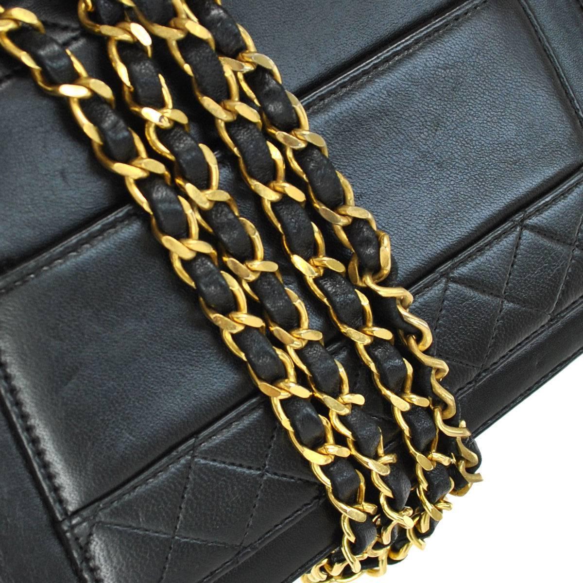 CURATOR'S NOTES

Chanel Vintage Black Lambskin Evening Gold Turnlock Kelly Box Flap Bag in Box 

A rare vintage Chanel gem with original accessories.  Expecting a quick sale on this beauty.

Lambskin
Gold tone hardware
Turnlock closure
Leather