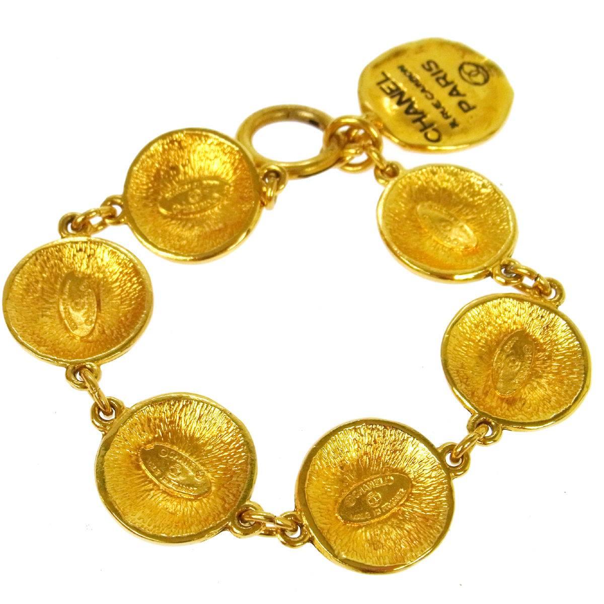 Chanel Gold Multi Charm Rue Cambon Bracelet In Excellent Condition In Chicago, IL