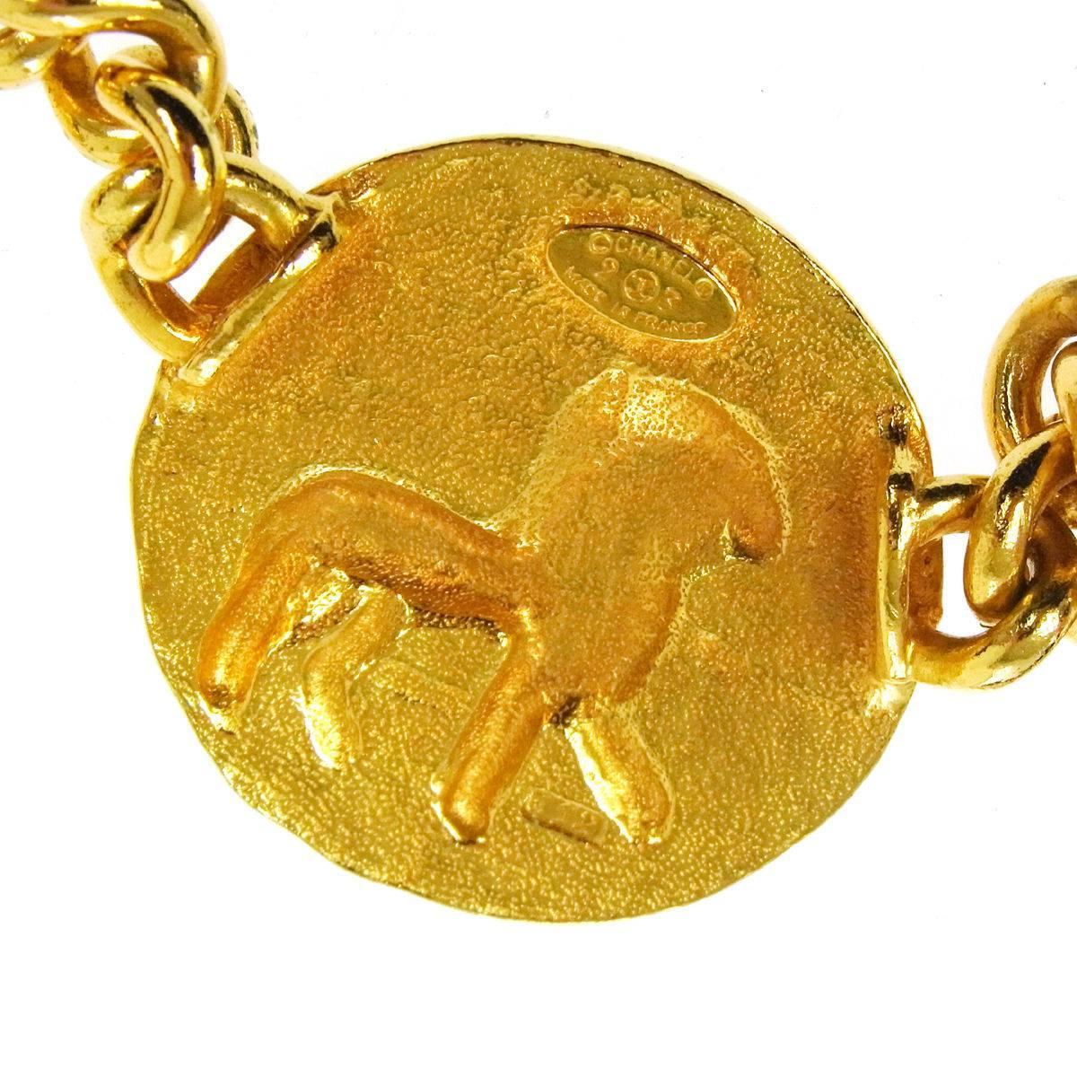 Chanel Vintage Gold Chain Link Lion Pendant Charm Choker Necklace in Box

Metal
Gold tone
Lobster claw closure
Made in France
Chain length 16.5 
