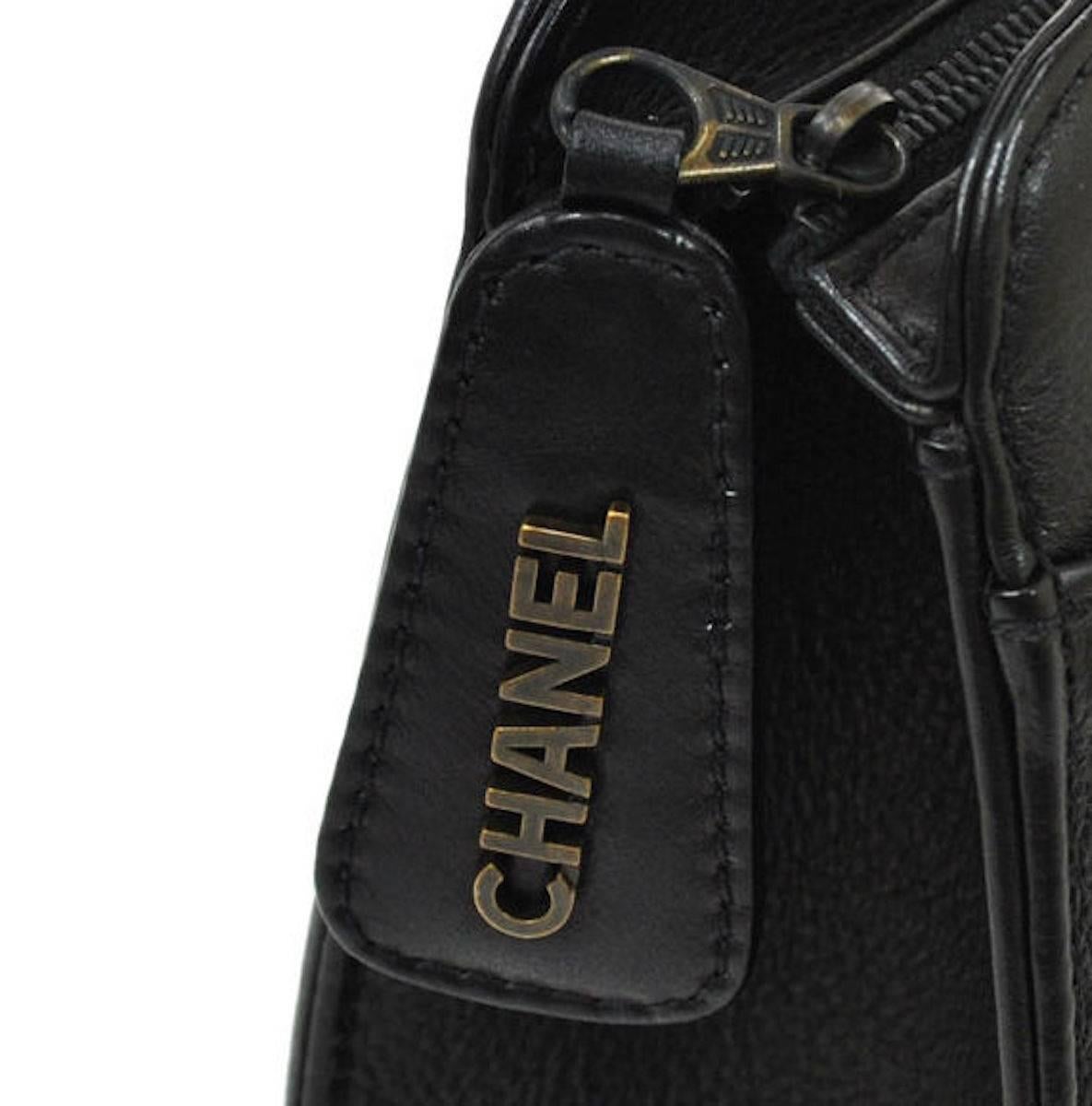Chanel Leather Shopper Top Handle Bag With Accessories 

Leather
Antique gold tone hardware
Zipper closure
Date code 
Made in France
Strap drop 6