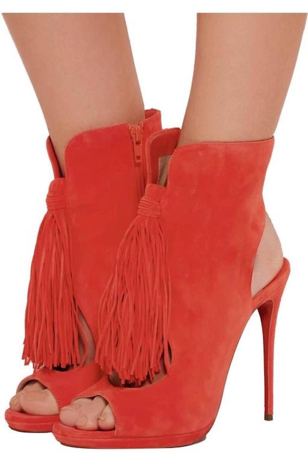 CURATOR'S NOTES  

Christian Louboutin NEW & SOLD OUT Orange Suede Fringe Sandals Heels in Box  

Size IT 39
Suede 
Zipper closure 
Made in Italy 
Heel height 5" 
Includes original Christian Louboutin box