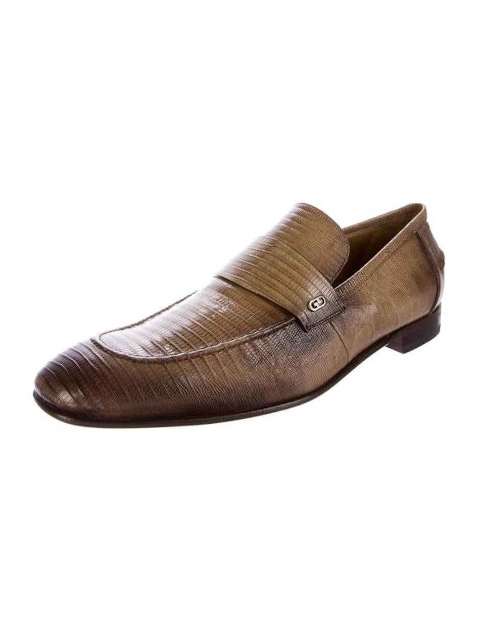 CURATOR'S NOTES  

Gucci NEW Men's Brown Tan Lizard Skin Leather Slippers Loafers Shoes in Box    

Size listed 12 
Lizard  
Leather lining 
Slip on
Made in Italy 
Heel height 1
