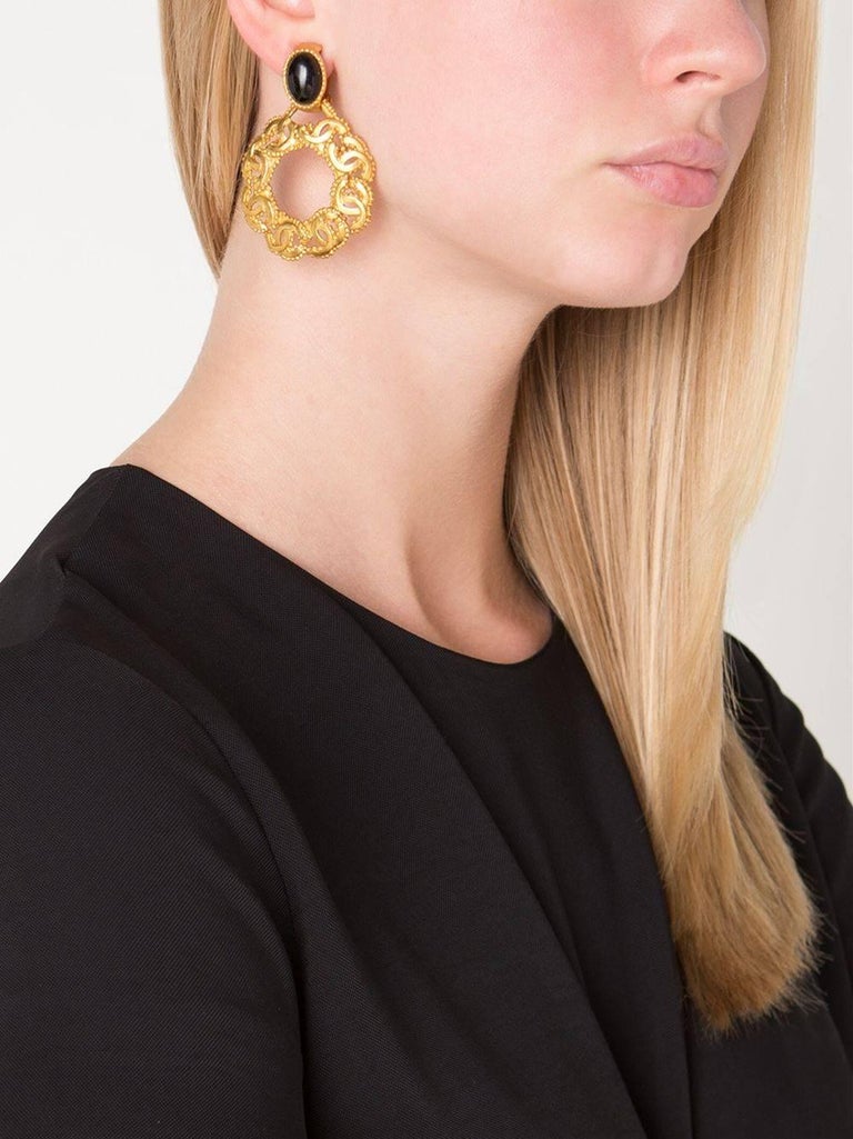 Goldtone filigree carved hoop style earrings 80s