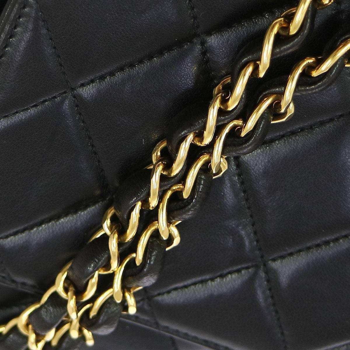 CURATOR'S NOTES

Chanel Black Lambskin Quilted Camera Flap Evening Crossbody Shoulder Bag 

Lambskin
Gold tone hardware
Magnetic clap closure
Leather lining
Made in France
Date code present
Shoulder strap drop 18"
Measures 11" W x