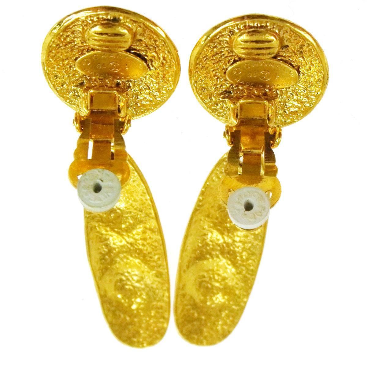 Chanel Gold Charm Long Tassel Evening Drop Earrings In Excellent Condition In Chicago, IL