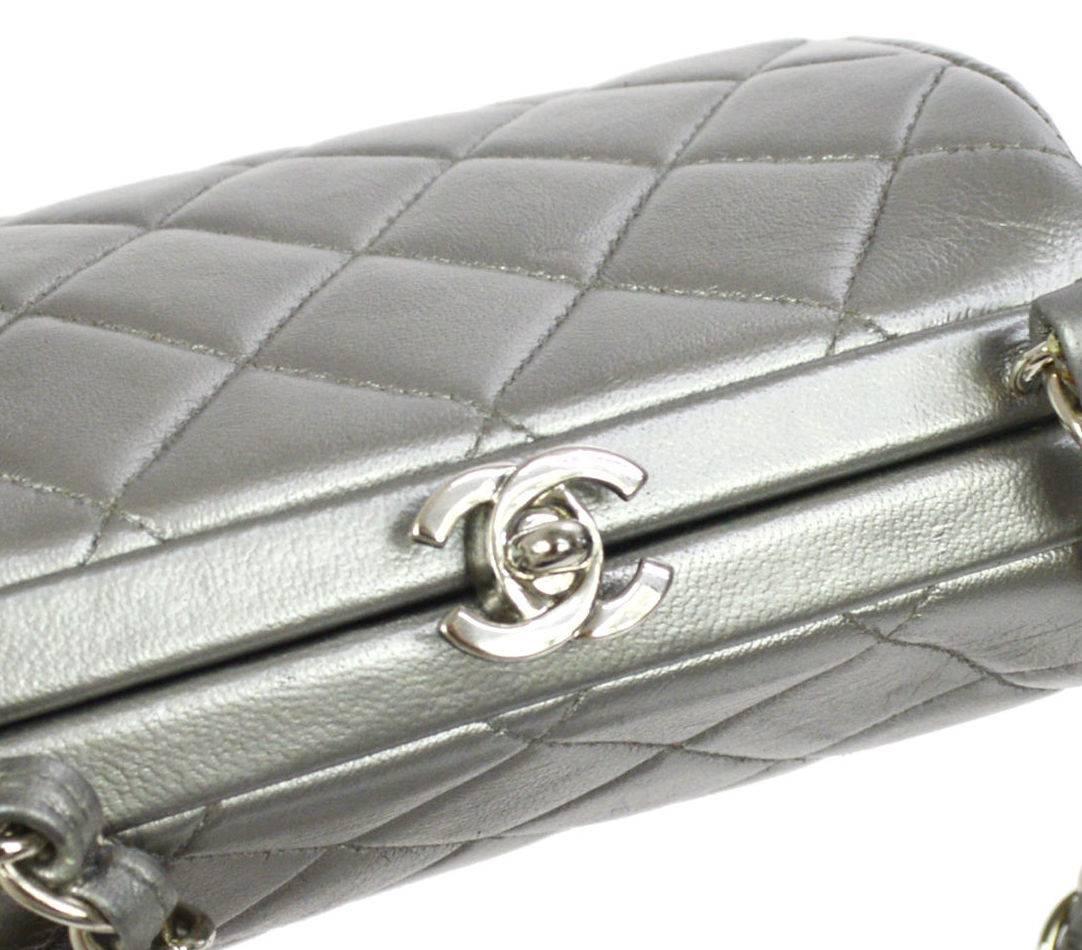 Chanel Silver Leather Party Kisslock Evening Flap Shoulder Bag

Leather
Silver tone hardware
Leather lining
Made in France
Shoulder strap drop 24"
Measures 5.75" W x 5" H x 3.5" D