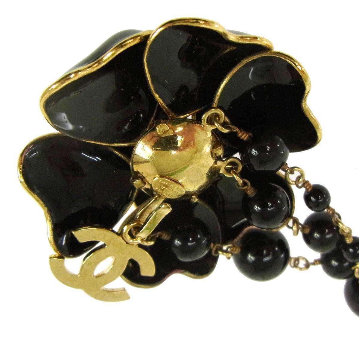 Chanel Black Gold Charm Flower Beaded Evening Waist Belt In Excellent Condition In Chicago, IL