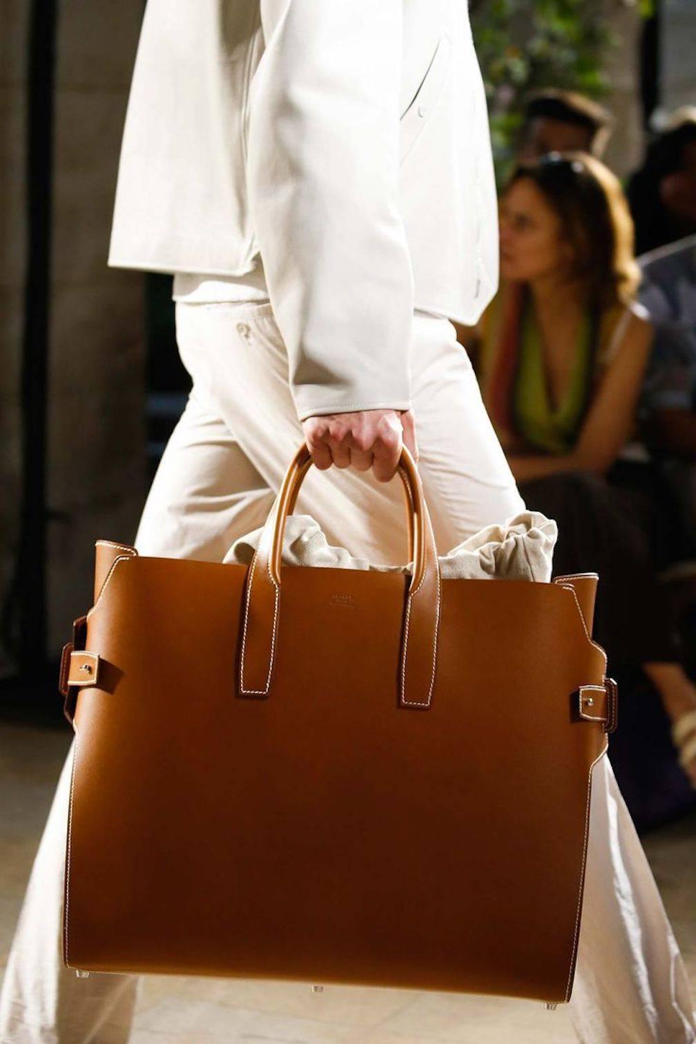 Hermes Runway Leather Cognac Men's Carryall Duffle Travel Weekender Tote Bag

Leather
Canvas
Palladium hardware 
Suede interior 
Drawstring closure
Made in France
Date code present 
Features removable canvas interior and shoulder strap
Handle drop
