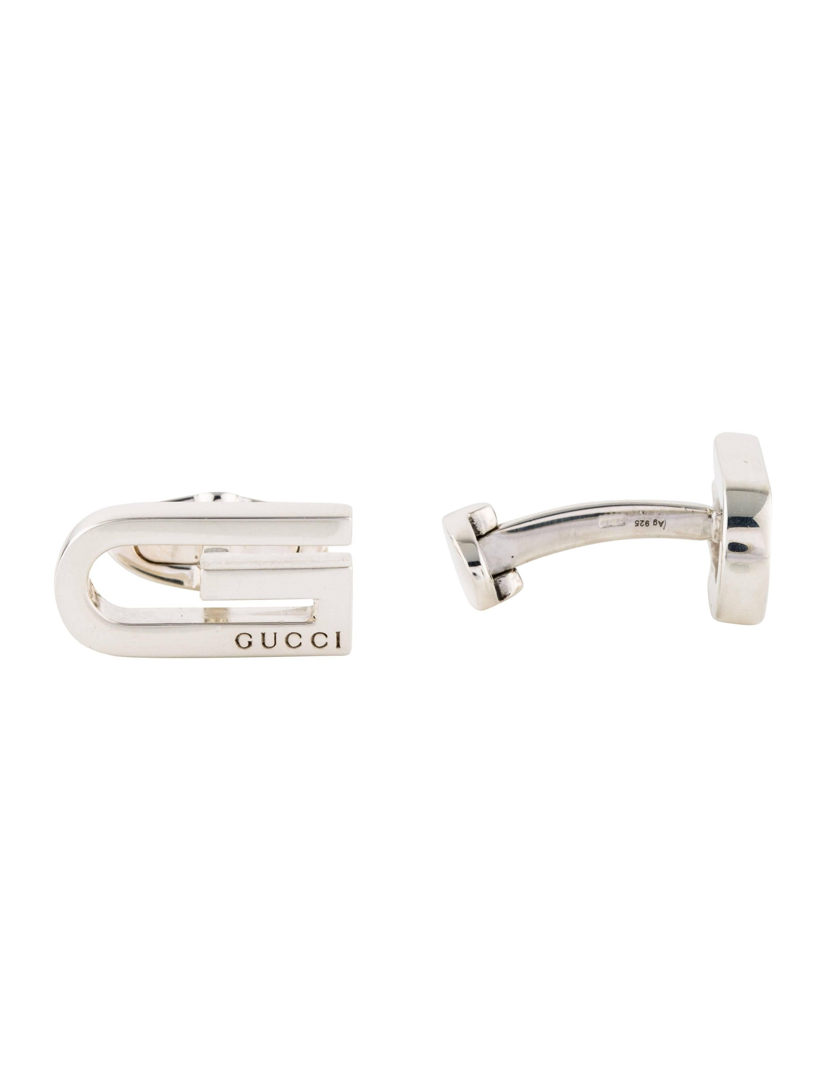 Gucci New Sterling Silver Square Men's Evening Suit Accessory Cuff Links in Box

Genuine sterling silver - 925 
Whale back closure
Signed 
Made in Italy
Measures 0.70" W x 0.40" L
Includes original Gucci authentic card, storage pouch and