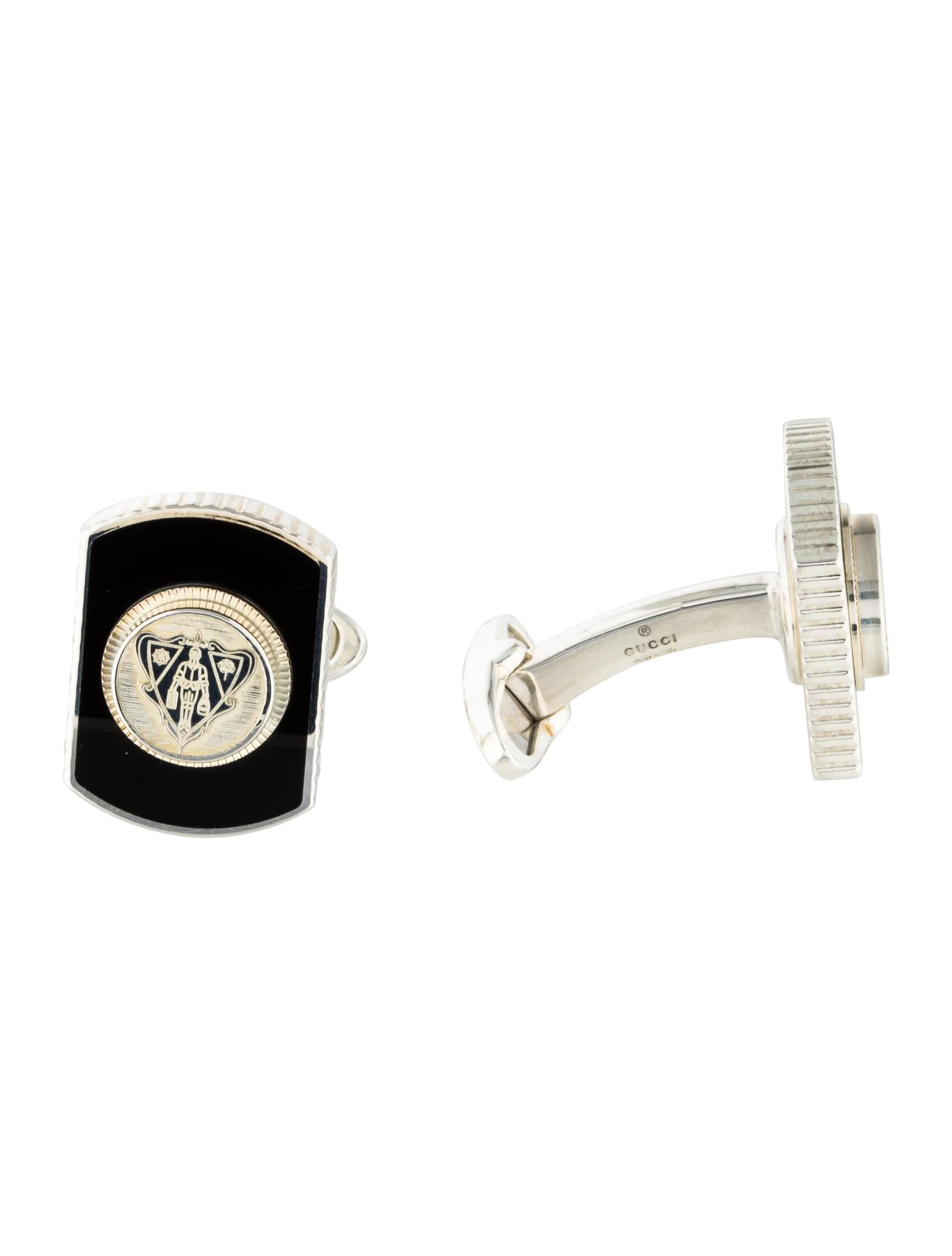 Gucci New Sterling Silver Black Hysteria Evening Suit Accessory Cuff Links in Box

Genuine sterling silver - 925 
Whale back closure
Signed 
Made in Italy
Measures 0.75" W x 0.50" L
Includes original Gucci authentic card, storage pouch and