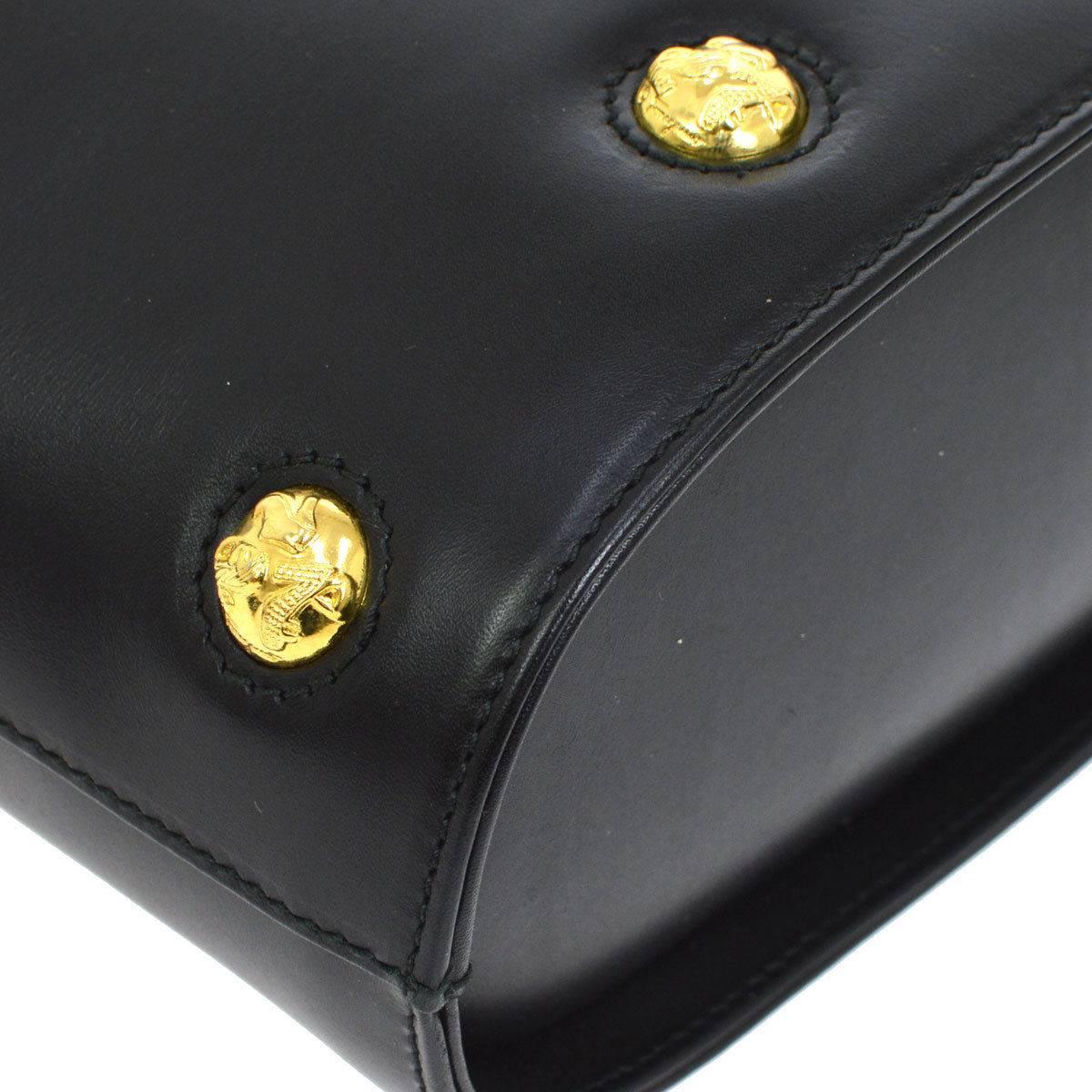 black purse with gold studs