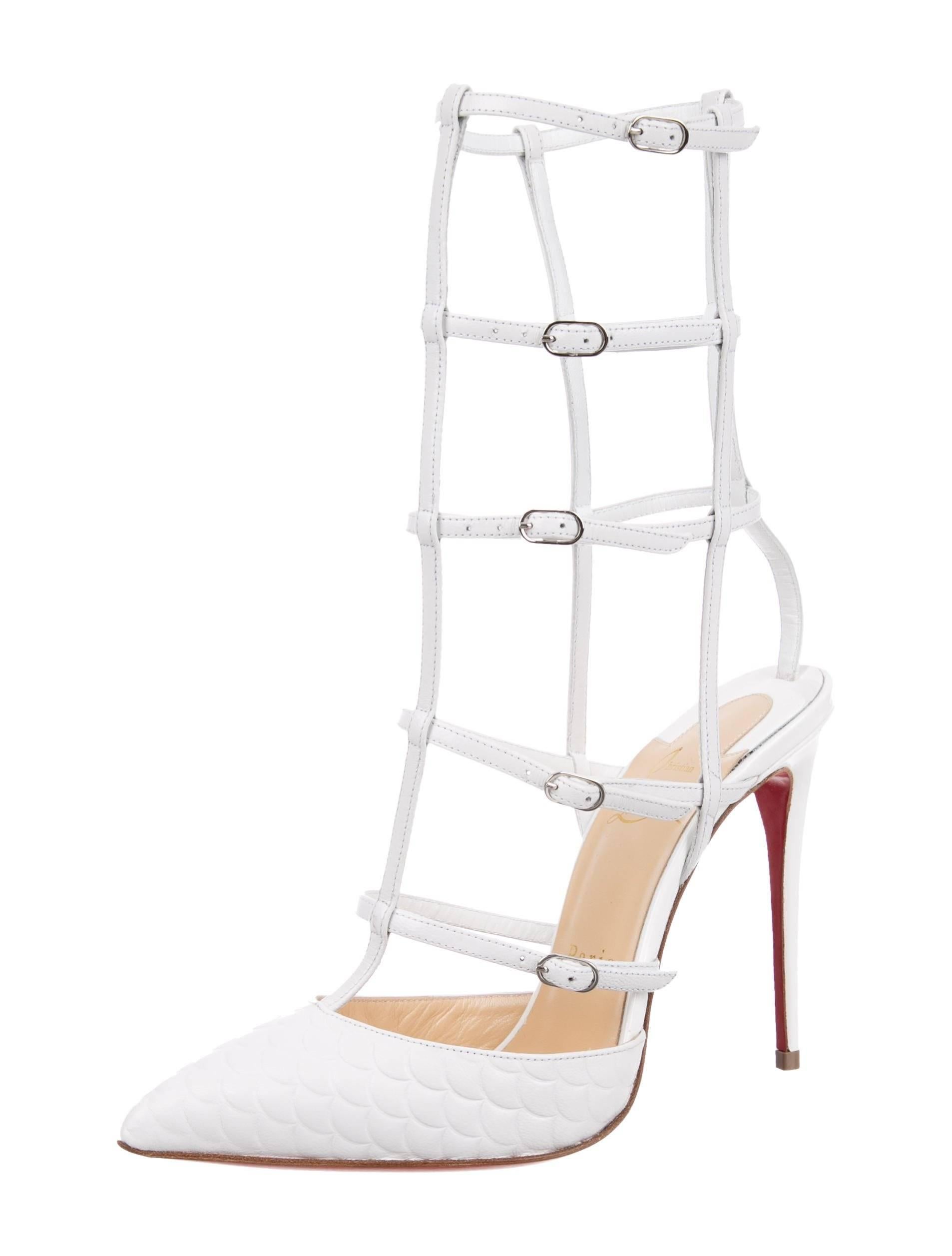 Christian Louboutin NEW White Leather Cage Evening Sandals Heels Pumps in Box

Size IT 36.5
Leather
Silver tone hardware
Ankle buckle closure
Made in Italy
Heel height 4.25