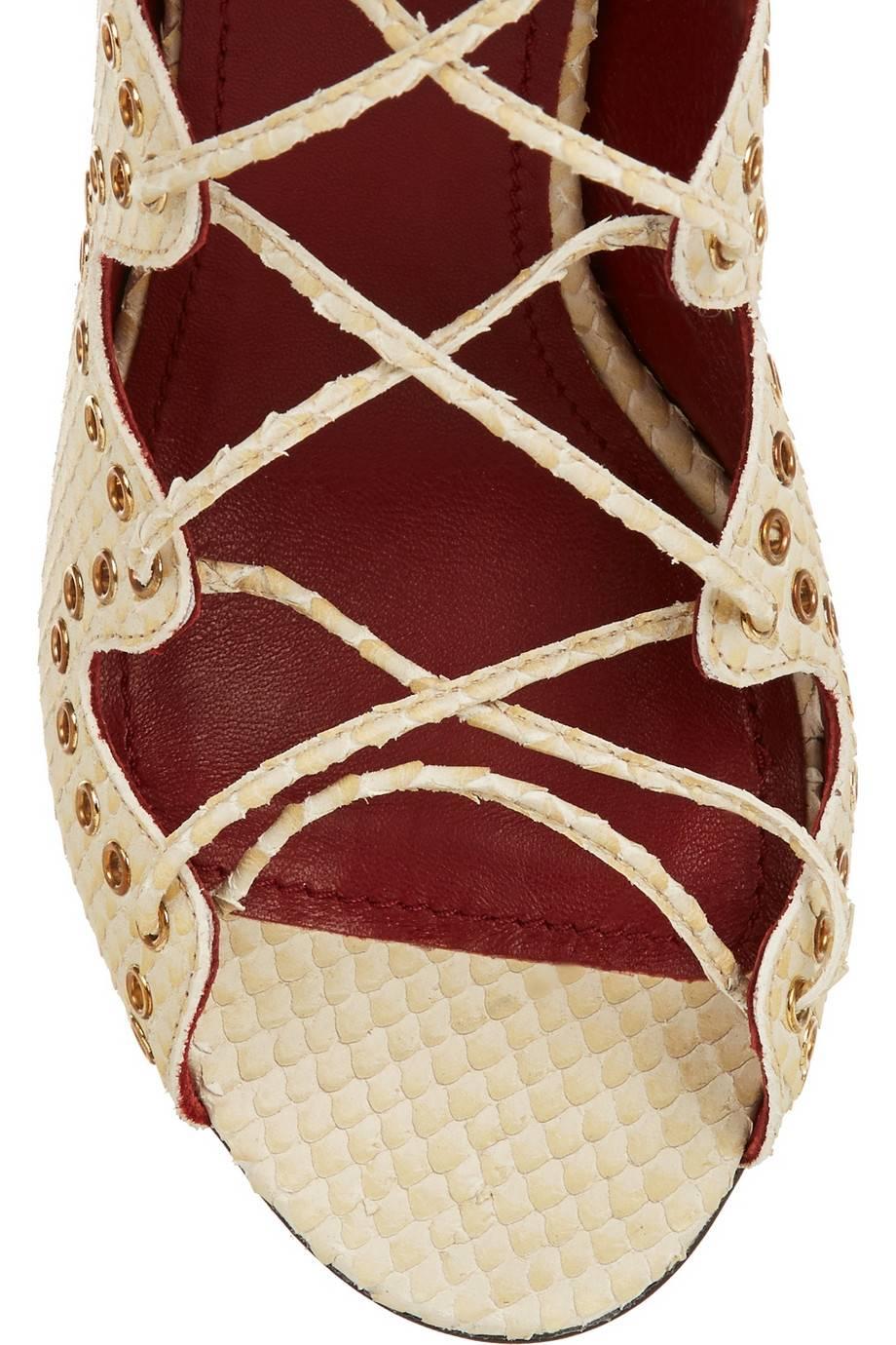 Just in time for spring: Dreamy creamy brand NEW Isabel Marant snakeskin print cream leather tie up sandals. 

Size FR 37 (US 6)
Leather
Zipper back and tie closures
Heel 4