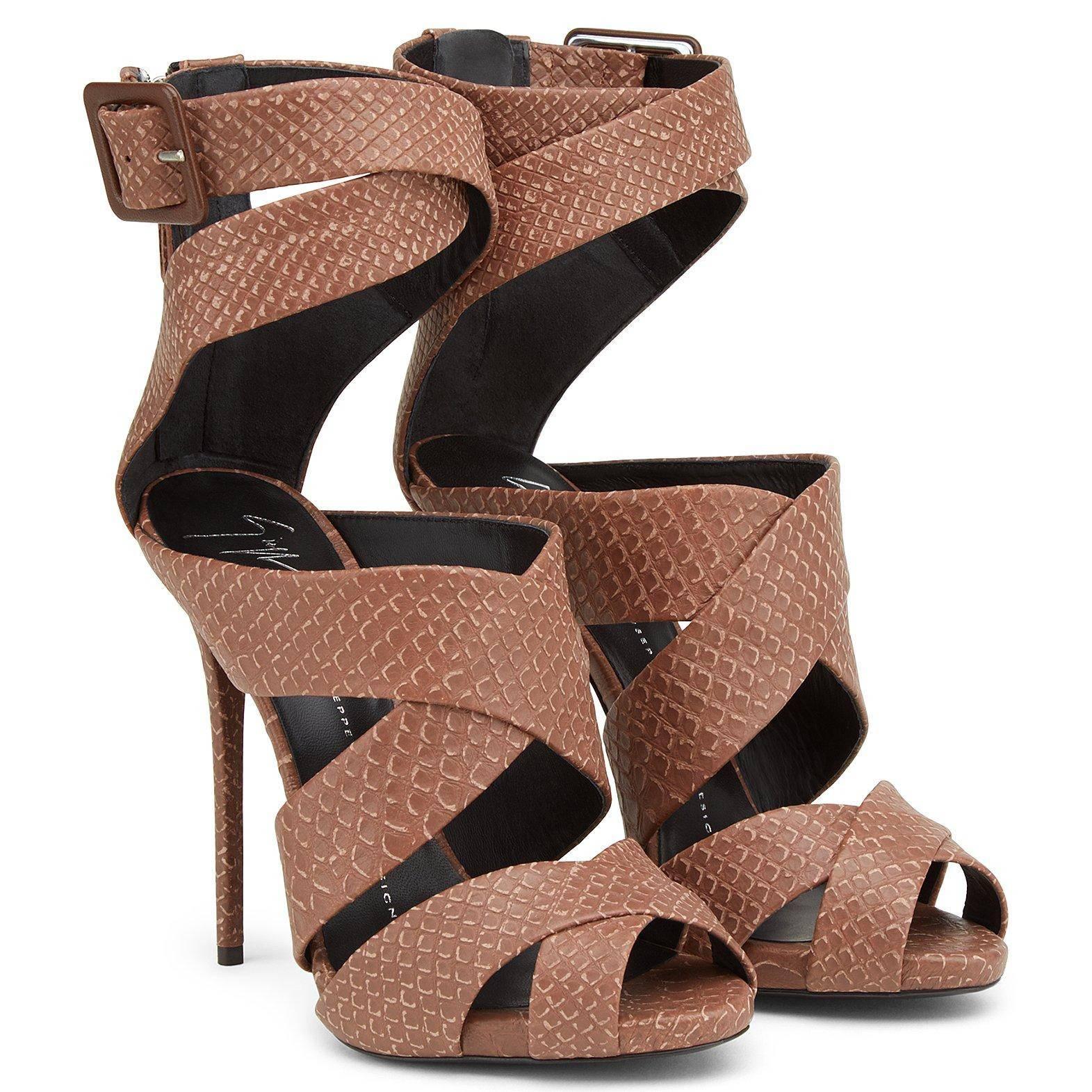 Giuseppe Zanotti New Python Embossed Leather Nude Cognac Strappy Heels in Box

Size IT 36
Python embossed
Leather
Made in Italy
Buckle and zipper closure
Heel height 4.75
