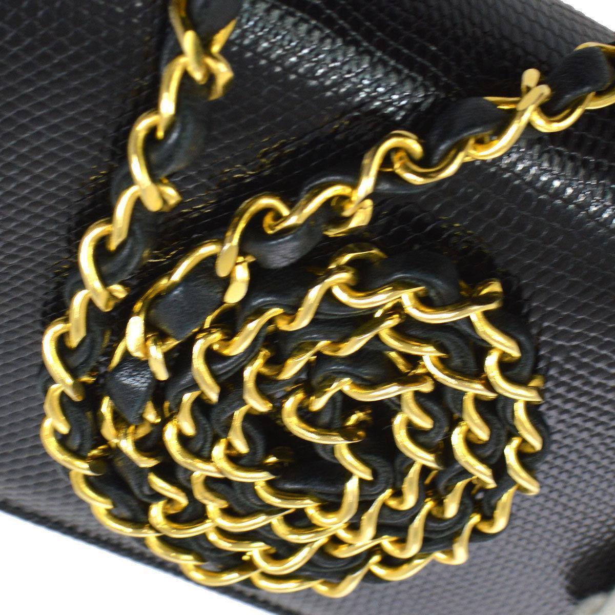 Chanel Black Lizard Gold WOC Wallet on Chain Clutch Evening Flap Shoulder Bag

Lizard
Gold tone hardware
Leather lining
Date code present
Made in France
Shoulder strap drop 17