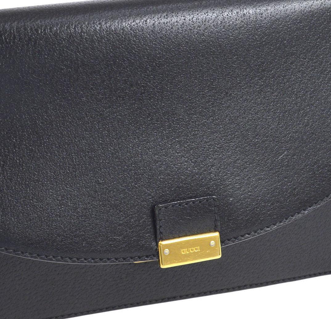Gucci Vintage Black Leather Envelope Flip Lock Evening Clutch Wristlet Flap Bag

Leather
Gold tone hardware
Flip lock closure
Woven lining
Made in Italy
Measures 9.75