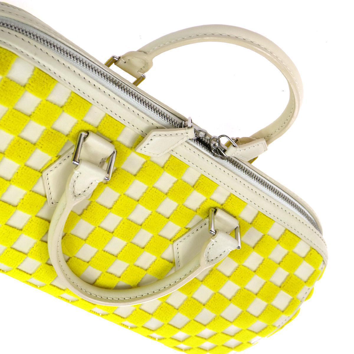 Louis Vuitton Ivory Yellow Fabric Leather Top Handle Satchel Bag W/Accessories

Fabric
Leather
Silver tone hardware
Woven lining
Date code present
Made in France
Handle drop 3