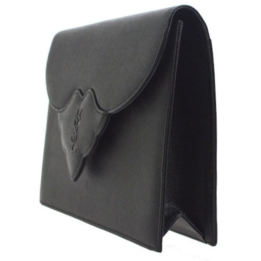 YSL Yves Saint Laurent Black Leather Envelope Evening Flap Clutch Bag

Leather
Twill lining
Button closure 
Measures 9.5