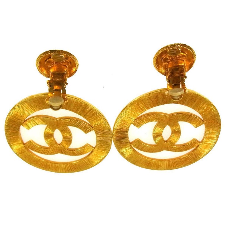 chanel cc large gold dangling earrings