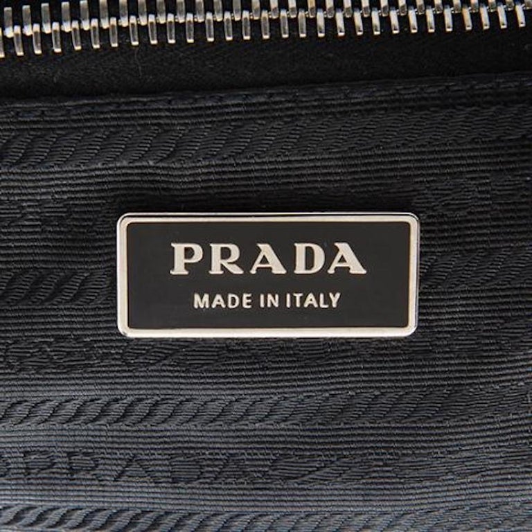 Prada metal tag clearance