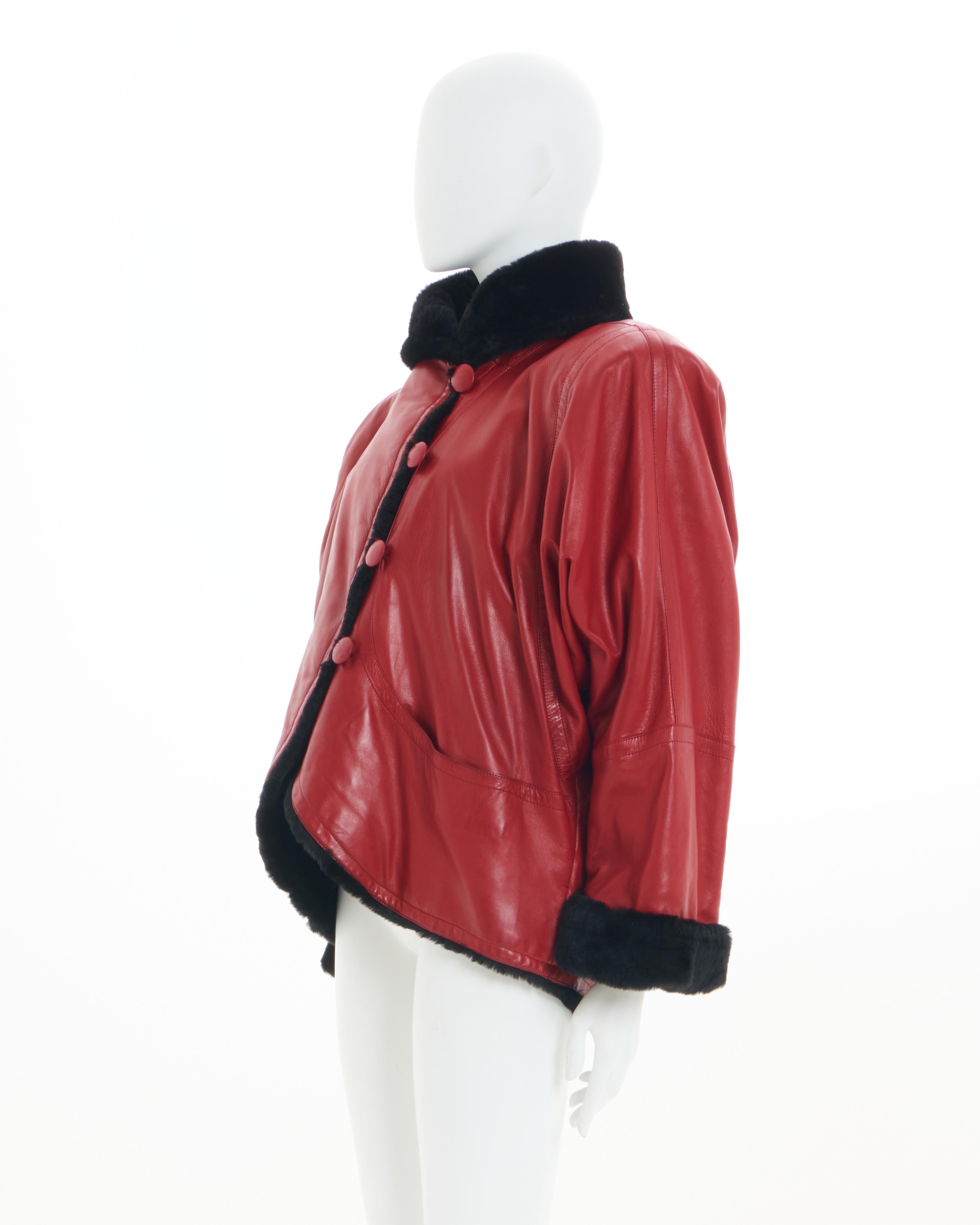 Yves Saint Laurent Fourrures
80s period
Red leather jacket with black lambskin fur trim
Side slit pockets
Frontal buttons closure
Oversized fit
Bat-wing sleeves
Made in France
Size: IT 40 - FR36 - UK8 - US4
Fabric: Leather and Lambskin
Condition: