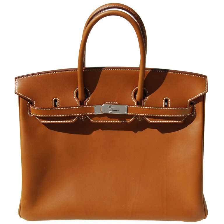 Beautiful Handbag

Brand New

35cm Hermes Barenia Leather Birkin Handbag | White Stitching | Palladium Hardware | Q Stamp

The bag measures 35cm / 14