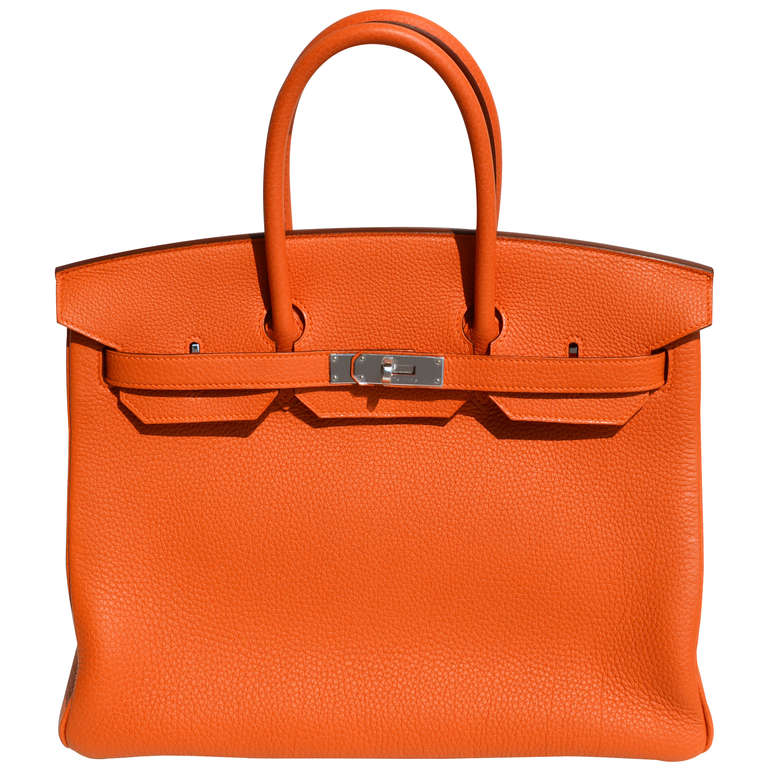 Bright & Fun Color!

Brand New

35cm Hermès Orange Togo Leather Birkin Handbag | Palladium Hardware | P Stamp

The bag measures 35cm / 14