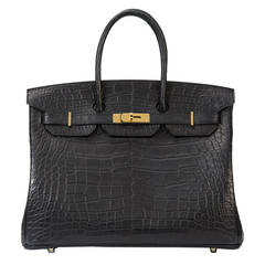 Ultra chic! Black matte croc with gold!
