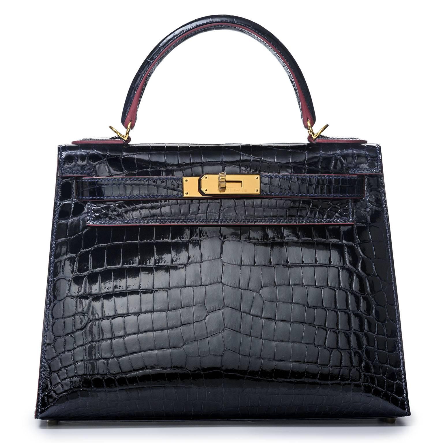 Extremely rare collectors item! 
Limited Edition! Very very few made in crocodile!
Only 1 here at 1stDibs!

Kelly Sellier 28 cm CONTOUR RED Bleu Marine Shiny Nilo Croc with gold hardware! Absolutely stunning bag looking for new owner