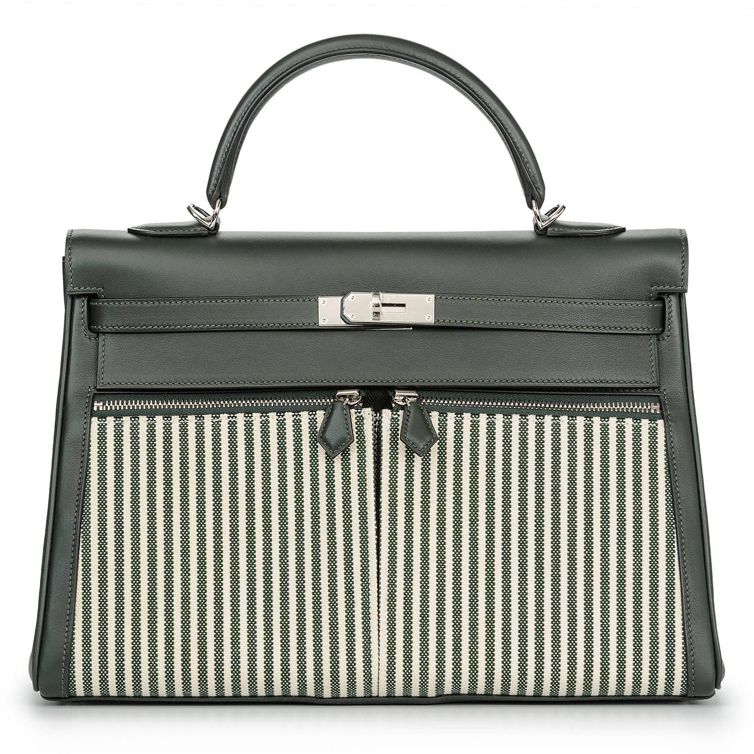 ONLY ONE ON STDIBS!

Ultra limited!

Collectors item!

NEW FULL SET KELLY LAKIS BAG 

Kelly Lakis 35 cm made from swift leather in Vert Foncé colour combined with striped canvas toile in ecru and vert anglais.

The bag is NEW and comes as