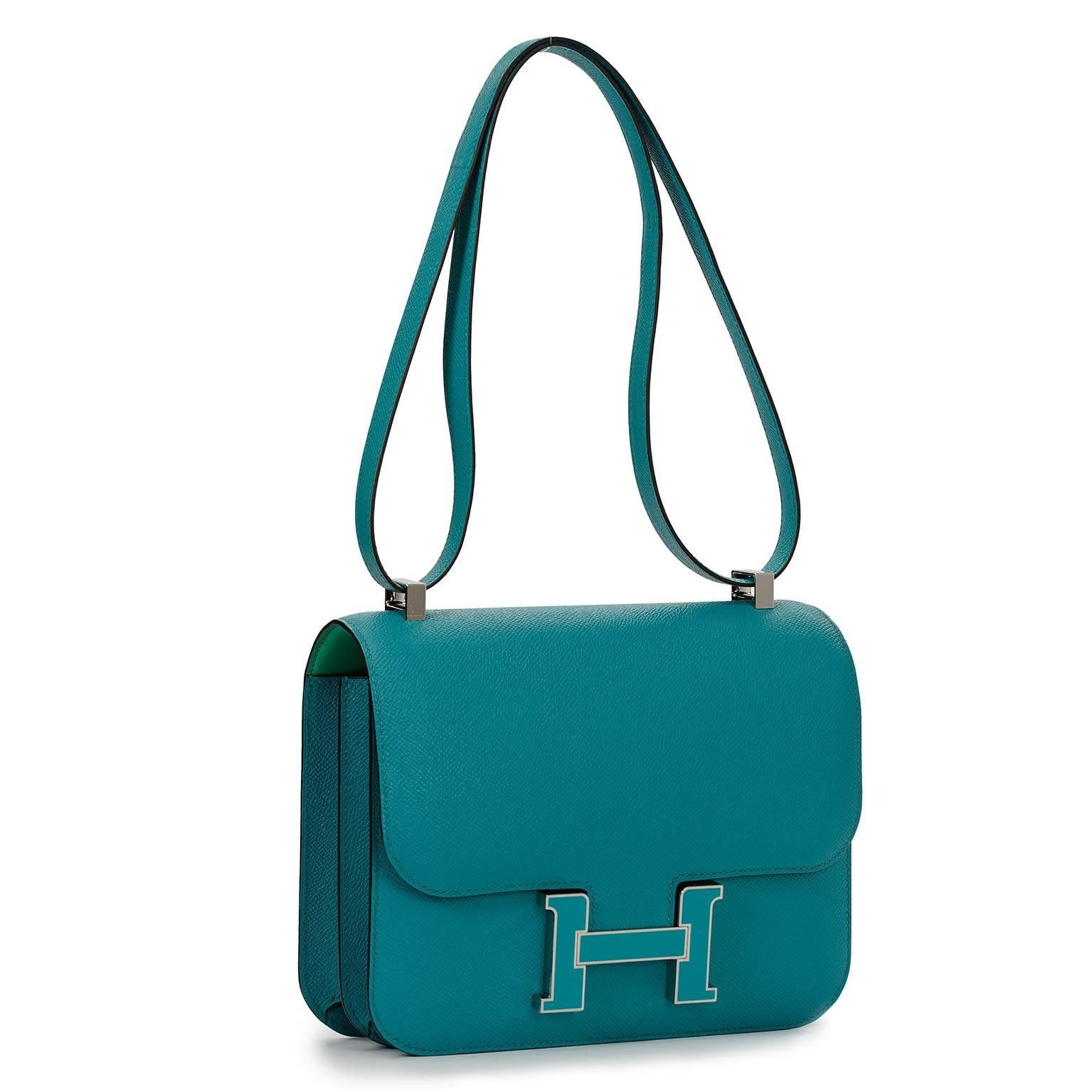Limited Edition!
Rare!
Collectors item!

Constance 24 cm made in Blue Paon Epsom leather with a matching enamel H clasp on its flap closure and as a bonus green Mint inside!!! 
Full set with original Hermès store receipt and original packaging.

Bag