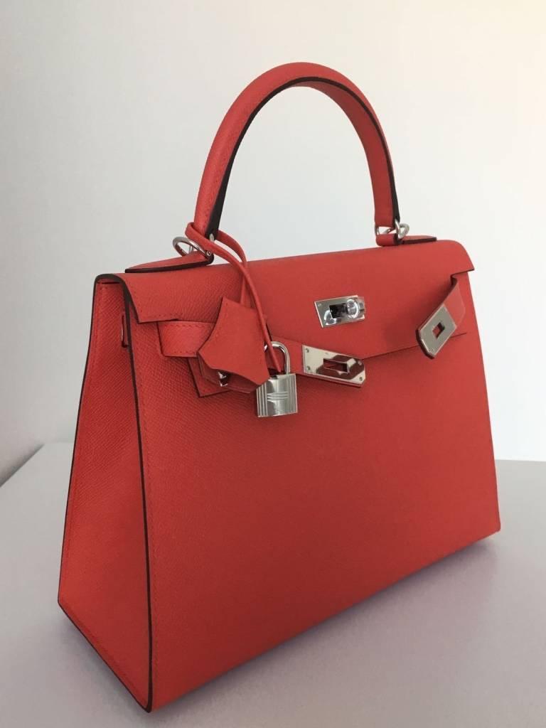 We have this stunning Kelly Sellier bag for sale in size 28 made in vibrant red epsom leather and accentuated with silver hardware. 

Full BNIB set with original receipt.
Unused condition with protective seals. 

Contact us for more details.

FIRST