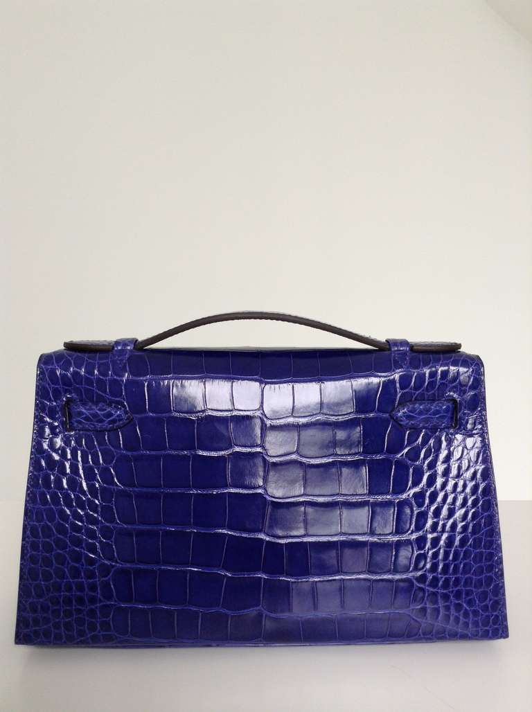 So rare!
So beautiful!
So chic!

FIRST makes your dreams come true! Kelly Mini Pochette made of Blue Electric alligator leather finished with gold.

Please note:
For sales outside EU we need to apply for an export cites certificate which