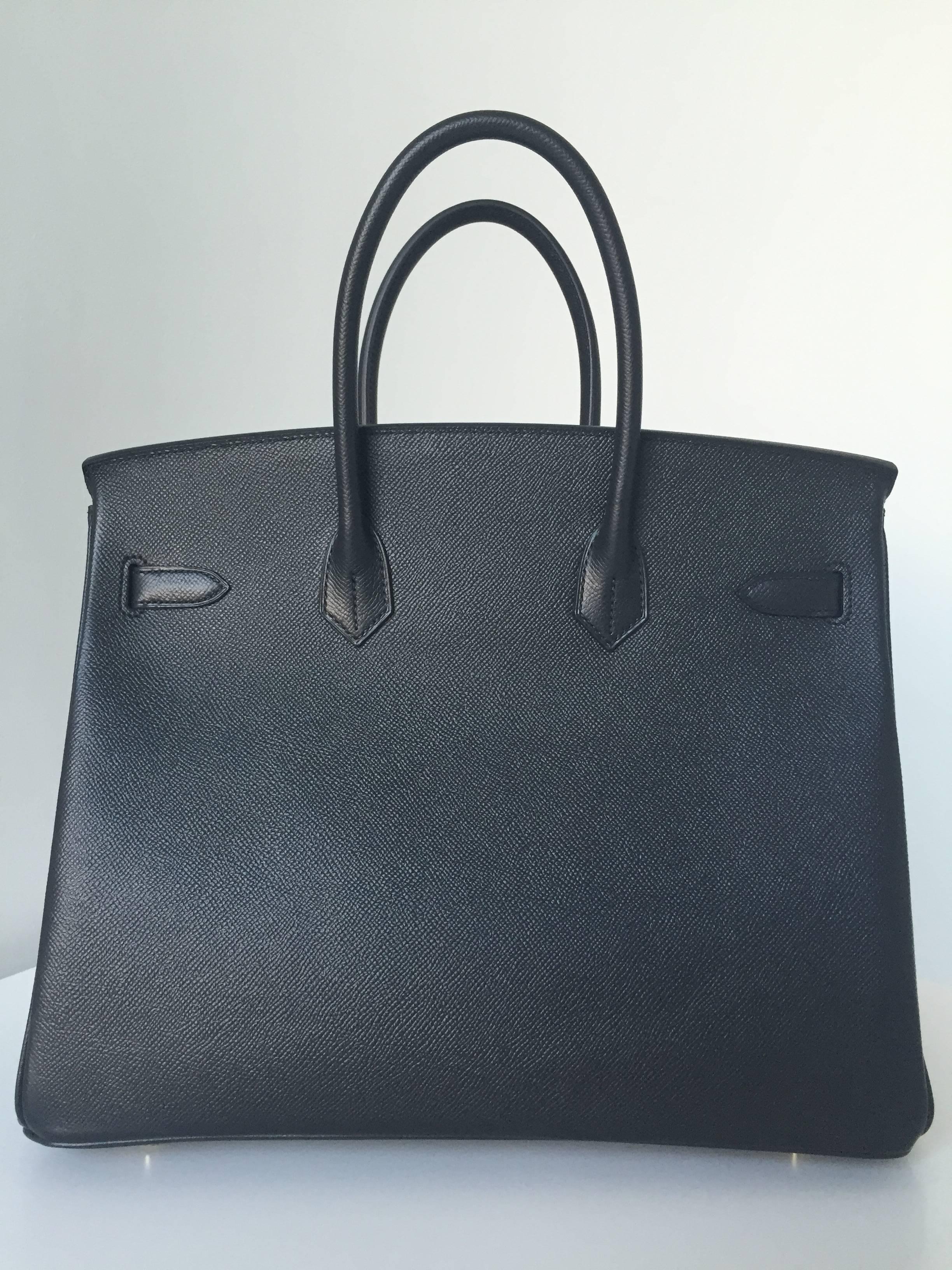 We have this super beauty available, made in black epsom combined with gold hardware its a must in every ladies wardrobe!

This Birkin is made from Epsom which is an embossed leather, lightweight and sturdy that holds it's shape and is scratch