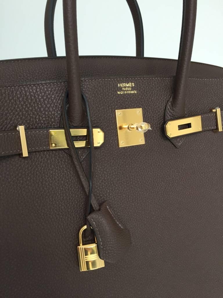 Extremely nice combo! 

BNIB!

35 cm Brown Birkin made of togo leather, ultra matte and ultra strong, with gold hardware that enlightens the brown colour.

Comes as a complete set.

We ship asap. Buy today enjoy this bag still this week.