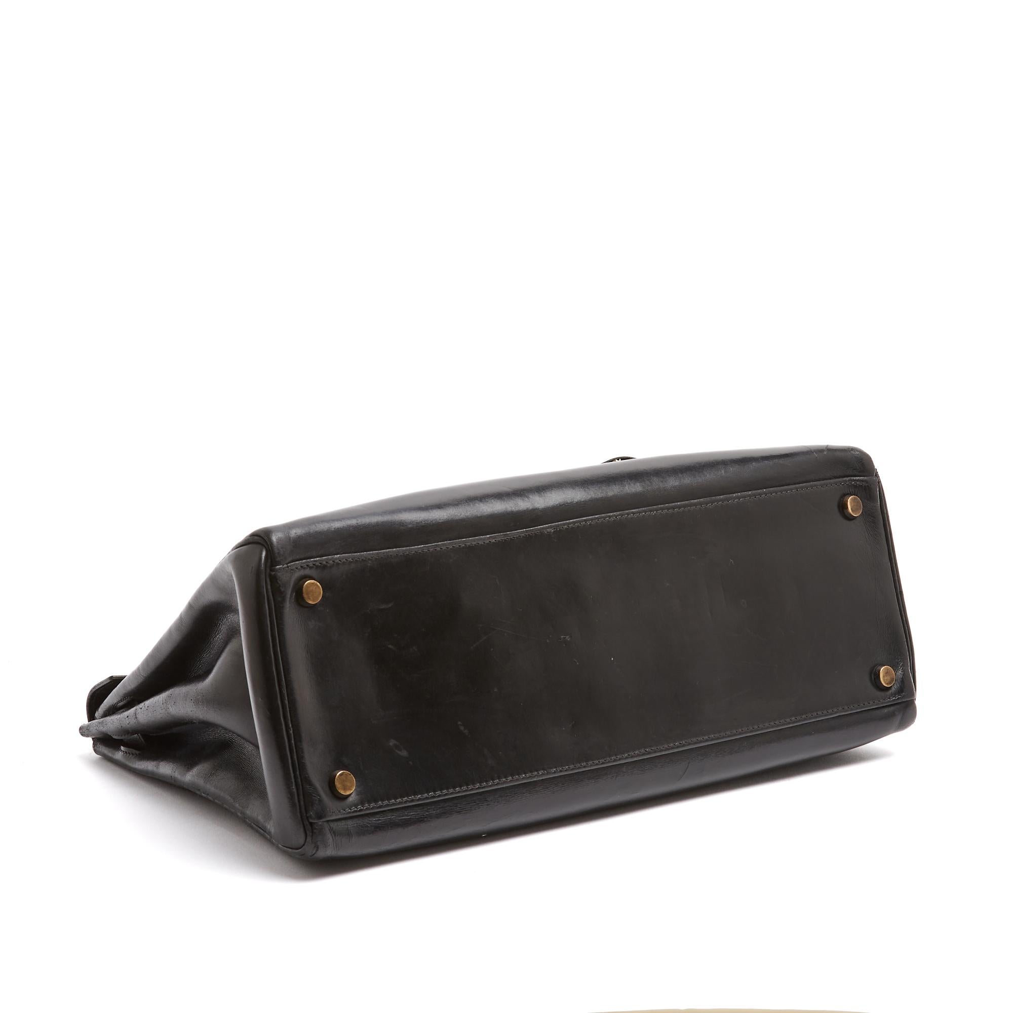 Hermès Sac Main 1965s Sac à main Kelly 32 en cuir noir avec bandoulière Hermès Unisexe en vente