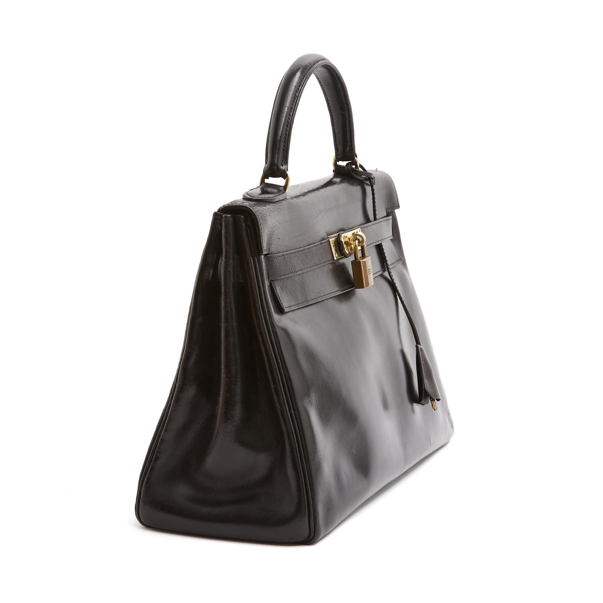 Sac Hermès Kelly, taille 32, en cuir noir 