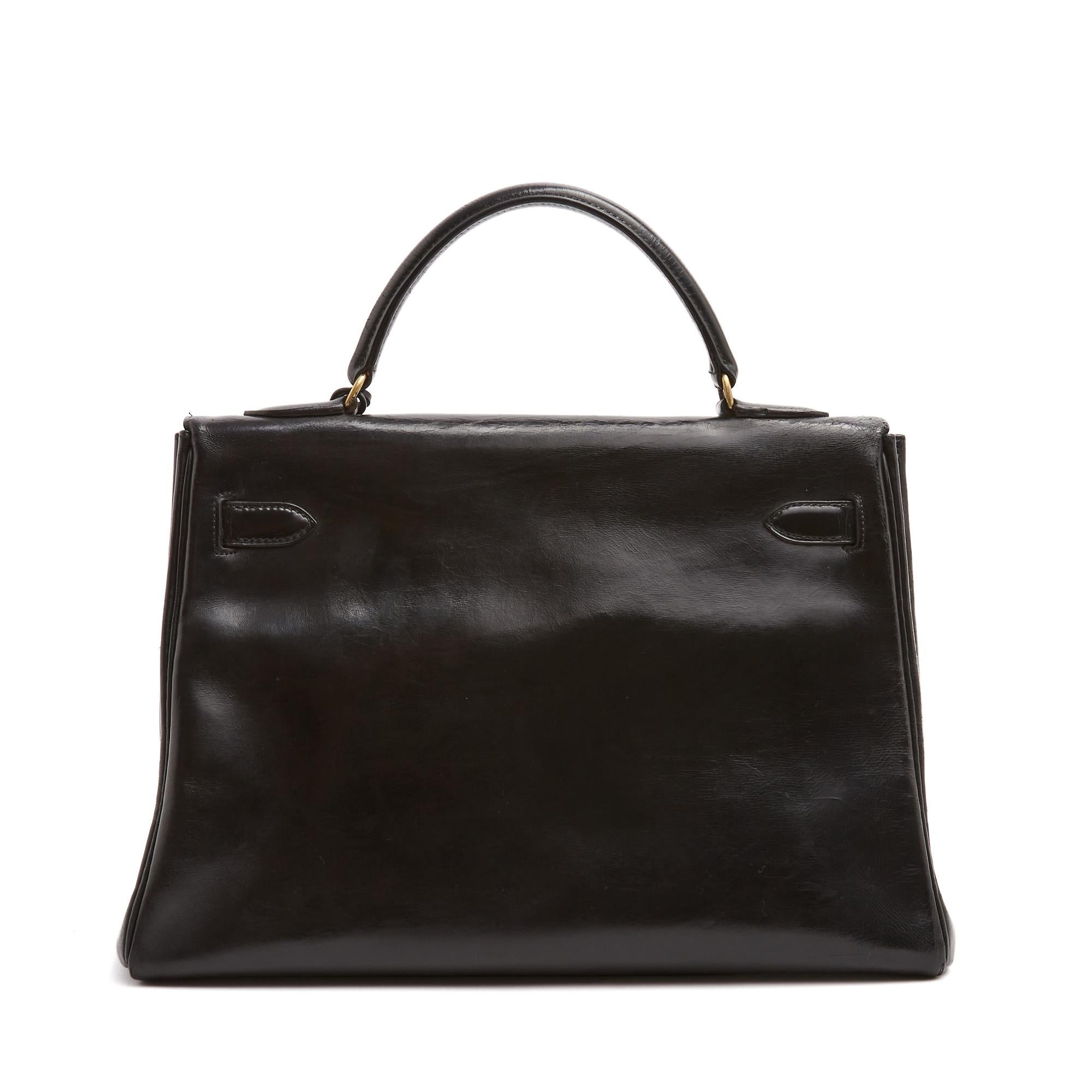 Noir Hermès Sac Main 1965s Sac à main Kelly 32 en cuir noir avec bandoulière Hermès en vente