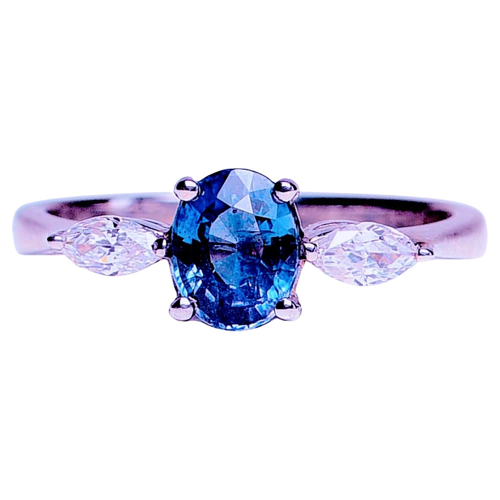 Contemporary  1ct Natural Untreated Oval Blue Sapphire 3 Stone Ring   For Sale