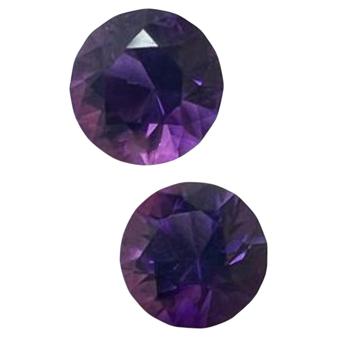 Enhance your jewelry collection with this stunning 7.15ct Round Cut Natural Purple Amethyst Loose Gemstone Pair. This exceptional gemstone showcases the beauty of natural amethyst in a brilliant round cut.

Gemstone Details:
Weight: 7.15