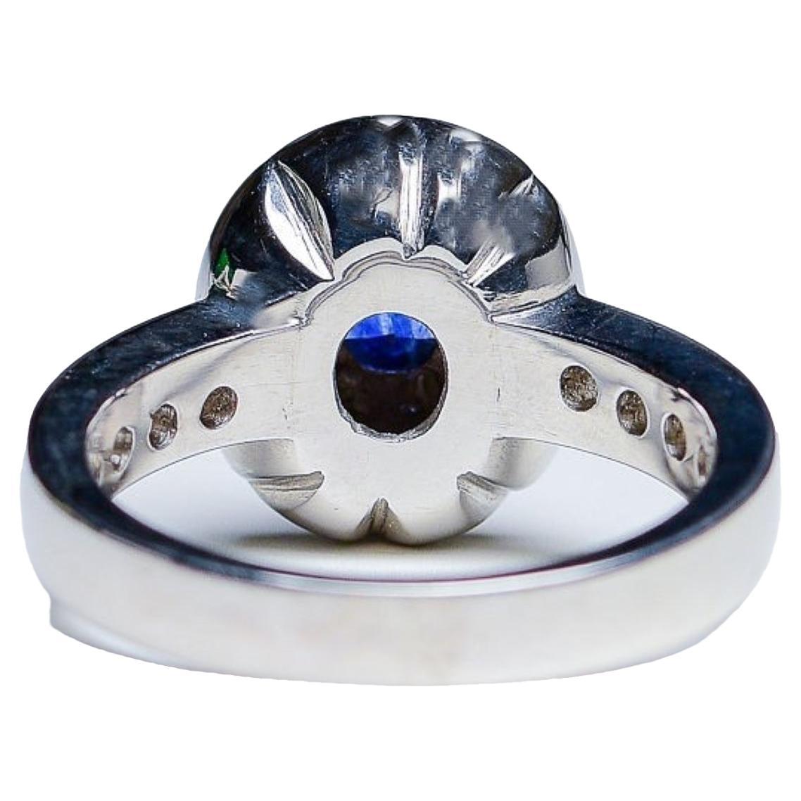 Contemporary 1ct Natural Oval Blue Sapphire Engagement Ring For Sale