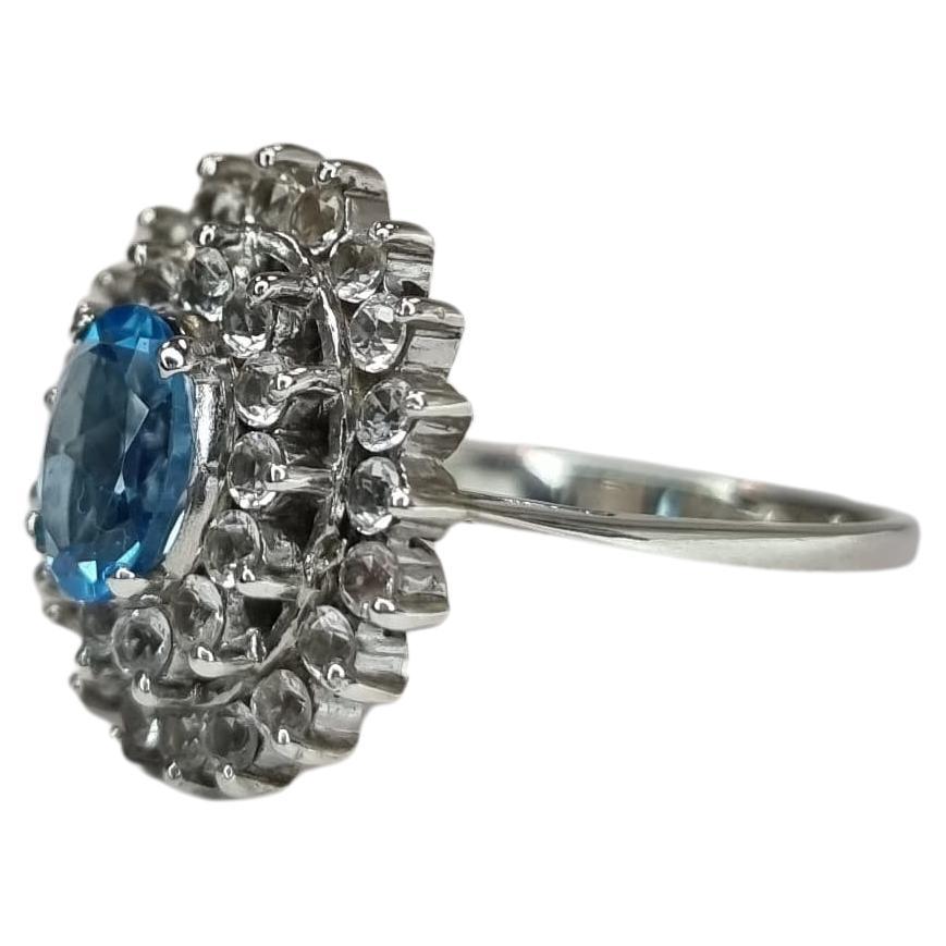 Contemporary 1ct Oval Natural Blue Topaz Cocktail Ring For Sale