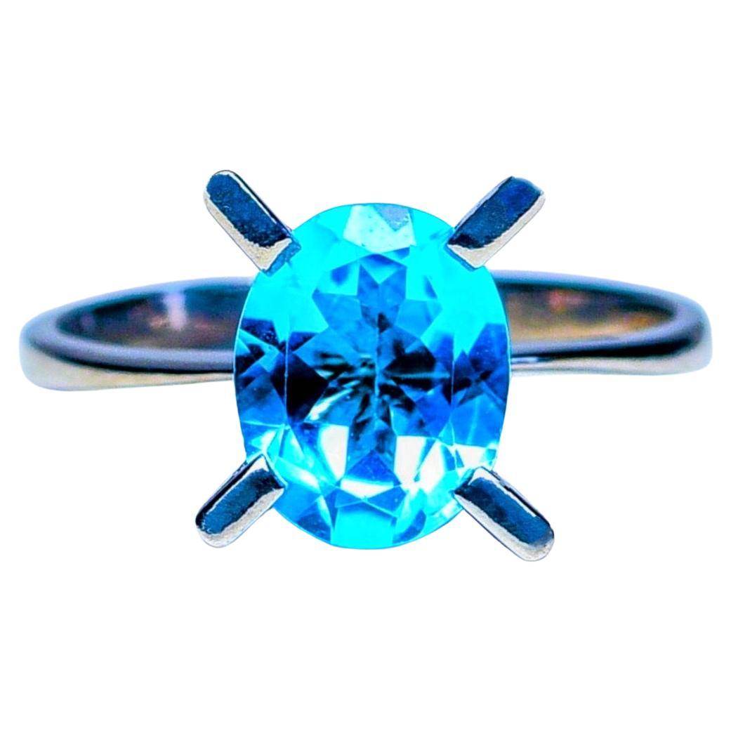  2.5ct Oval Cut Blue Topaz Solitaire Ring For Sale