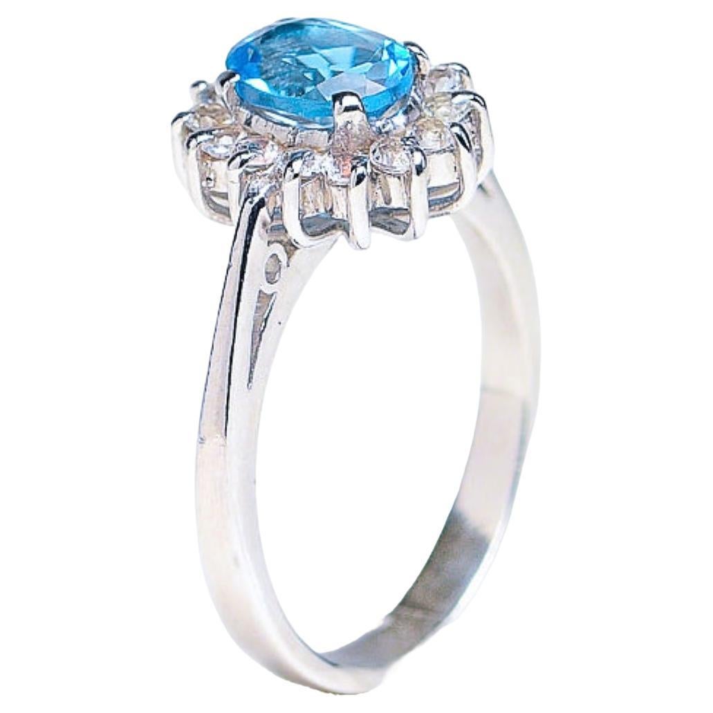 Oval Cut 1ct Oval Blue Topaz Platinum Silver Ring  For Sale