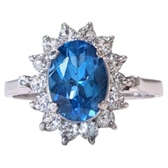Anello in argento platino con topazio blu naturale ovale da 1 carato