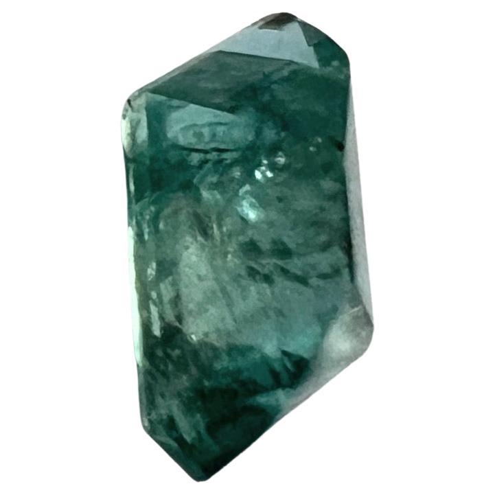 Introducing our exquisite 3.10ct Rectangular Cut Non-Oil Emerald Gemstone a radiant embodiment of nature's finest beauty and elegance. This stunning gemstone features a classic rectangular cut, meticulously crafted to highlight its captivating